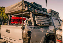 Load image into Gallery viewer, overland bed rack on a toyota tacoma