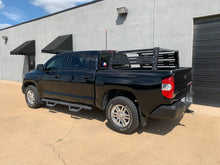 Load image into Gallery viewer, Rear drivers side view of black Toyota Tundra with Overland Bed Rack - Cali Raised LED
