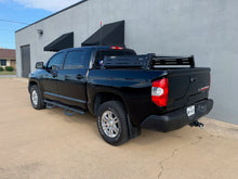 Load image into Gallery viewer, Rear drivers side view of black Toyota Tundra with Overland Bed Rack - Cali Raised LED
