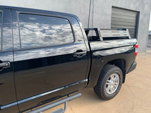 Load image into Gallery viewer, Drivers side angled view of black Toyota Tundra with Overland Bed Rack - Cali Raised LED
