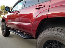 Load image into Gallery viewer, 2003-2009 TOYOTA 4RUNNER STEP EDITION BOLT ON ROCK SLIDERS
